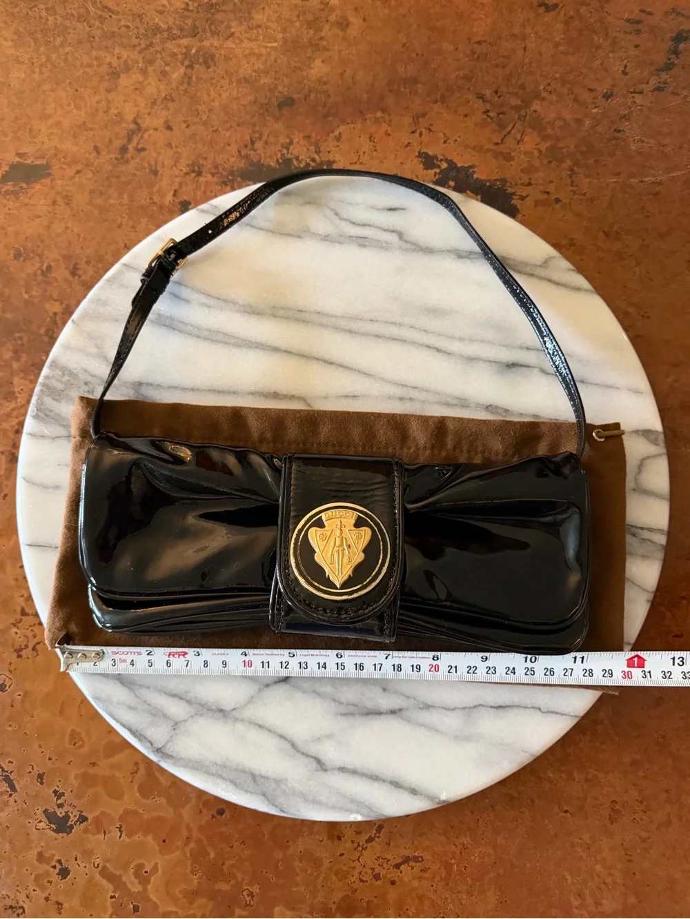 Vintage Gucci Black Patent Leather Clutch with Gold Crest